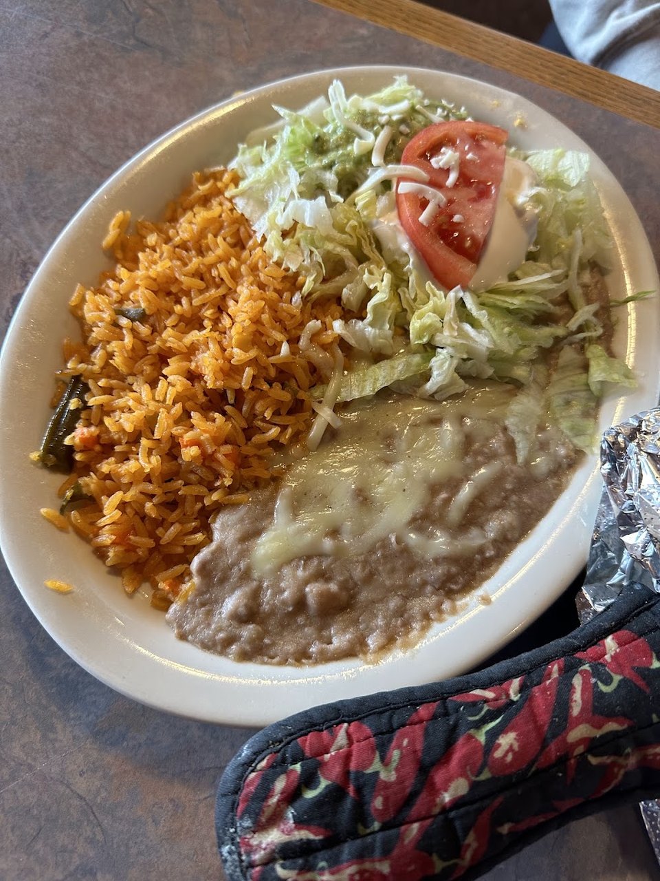 Bean Tostaguac Cheese Enchilada and Rice